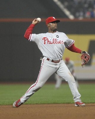 NEW YORK - JUNE 11:  Jimmy Rollins #11 of the Philadelphia Phillies in the field against the New York Mets on June 11, 2009 at Citi Field in the Flushing neighborhood of the Queens borough of New York City.  (Photo by Nick Laham/Getty Images)