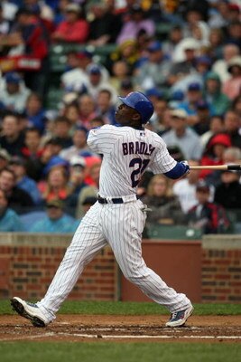 CHICAGO - JULY 8:  Milton Bradley #21 of the Chicago Cubs bats against the Atlanta Braves during the game on July 8, 2009 at Wrigley Field in Chicago, Illinois. (Photo by Jonathan Daniel/Getty Images) 