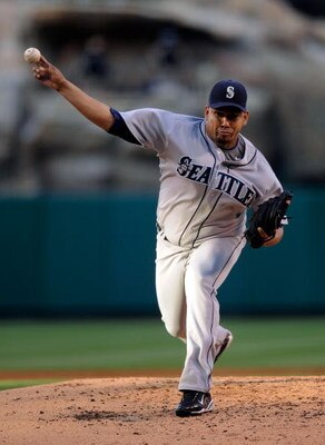 ANAHEIM, CA - APRIL 25:  Pitcher Carlos Silva #52 of the Seattle Mariners throws against the Los Angeles Angels of Anaheim during the thrid inning of the baseball game on April 25, 2009 at Angel Stadium in Anaheim, California.  (Photo by Kevork Djansezian
