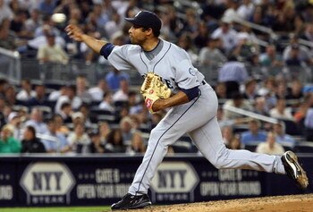 NEW YORK - JULY 01:  Miguel Batista #43 of the Seattle Mariners pitches against the New York Yankees on July 1, 2009 at Yankee Stadium in the Bronx borough of New York City. The Yankees defeated the Mariners 4-2.  (Photo by Jim McIsaac/Getty Images)