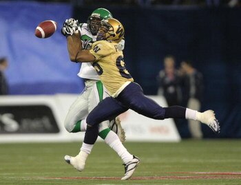 TORONTO, ON - NOVEMBER 25:  Arjei Franklin #83 of the Winnipeg Blue Bombers has a pass knocked away by Sean Lucas #31 of the Saskatchewan Rough Riders during the second quarter of the 95th Grey Cup on November 25, 2007 at the Rogers Centre in Toronto, Ont