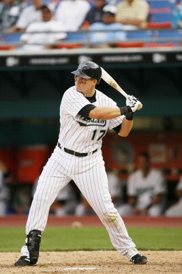 MIAMI - APRIL 11:  Mike Jacobs #17 of the Florida Marlins bats against the San Diego Padres during the home opener at Dolphin Stadium on April 11, 2006  in Miami, Florida. The Padres defeated the Marlins 9-3.  (Photo by Eliot J. Schechter/Getty Images)