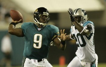 JACKSONVILLE, FL - AUGUST 19:  Chris Gamble #20 of the Carolina Panthers chases down quarterback David Gerrard #9 of the Jacksonville Jaguars on August 19, 2006 at Alltel Stadium in Jacksonville, Florida.  (Photo by Matt Stroshane/Getty Images)