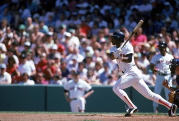 BOSTON - JULY:  Jim Rice #14 of the Boston Red Sox bats during a July 1985 game at Fenway Park in Boston, Massachusetts. (Photo by Rick Stewart/Getty Images)