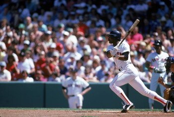 BOSTON - JULY:  Jim Rice #14 of the Boston Red Sox bats during a July 1985 game at Fenway Park in Boston, Massachusetts. (Photo by Rick Stewart/Getty Images)