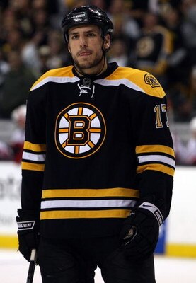 BOSTON - MAY 14:  Milan Lucic #17 of the Boston Bruins looks on before a face off against the Carolina Hurricanes during Game Seven of the Eastern Conference Semifinal Round of the 2009 Stanley Cup Playoffs on May 14, 2009 at the TD Banknorth Garden in Bo