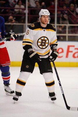 NEW YORK - MARCH 08:  Dennis Wideman #6 of the Boston Bruins skates down the ice against the New York Rangers on March 8, 2009 at Madison Square Garden in New York City, New York.  (Photo by Nick Laham/Getty Images)