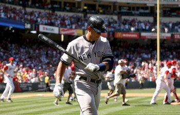 ANAHEIM, CA - JULY 12:  Alex Rodriguez #13 of the New York Yankees reacts as he returns to the dugout after striking out for the last out of the game against the Los Angeles Angels of Anaheim on July 12, 2009 at Angel Stadium in Anaheim, California.  The 