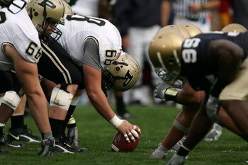 SOUTH BEND, IN - SEPTEMBER 30:  Center Robbie Powell #68 of the Purdue Boilermakers readies to snap the ball against the Notre Dame Fighting Irish September 30, 2006 at Notre Dame Stadium in South Bend, Indiana. Notre Dame won 35-21. (Photo by Jonathan Da