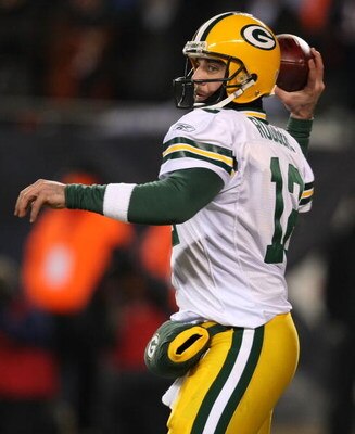 CHICAGO - DECEMBER 22: Aaron Rodgers #12 of the Green Bay Packers throws a pass against the Chicago Bears on December 22, 2008 at Soldier Field in Chicago, Illinois. (Photo by Jonathan Daniel/Getty Images)