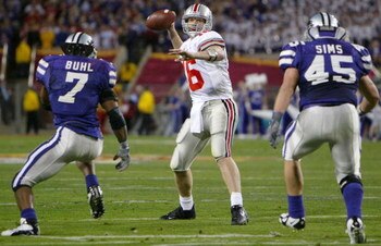 TEMPE, AZ - JANUARY 2:  Quarterback Craig Krenzel #16 of Ohio State looks for an open man against the defense of Kansas State during the first half of the Fiesta Bowl on January 2, 2004 at the Sun Devil Stadium in Tempe, Arizona.  (Photo by Jed Jacobsohn/