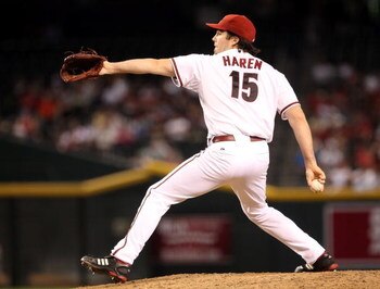 PHOENIX - JULY 10:  Starting pitcher Dan Haren #15 of the Arizona Diamondbacks pitches against the Florida Marlins during the major league baseball game at Chase Field on July 10, 2009 in Phoenix, Arizona. The Diamondbacks defeated the Marlins 8-0.  (Phot