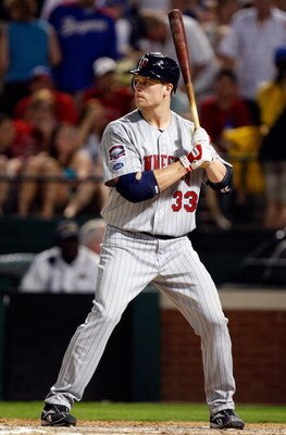 ARLINGTON, TX - JULY 17:  First baseman Justin Morneau #33 of the Minnesota Twins on July 17, 2009 at Rangers Ballpark in Arlington, Texas.  (Photo by Ronald Martinez/Getty Images)