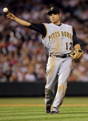 DENVER - JULY 19:  Second baseman Freddy Sanchez #12 of the Pittsburgh Pirates throws out a runner against the Colorado Rockies at Coors Field on July 19, 2008 in Denver, Colorado. The Rockies defeated the Pirates 7-1.  (Photo by Doug Pensinger/Getty Imag