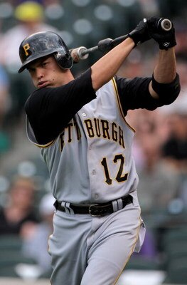 DENVER - JULY 19:  Second baseman Freddy Sanchez #12 of the Pittsburgh Pirates warms up on deck against the Colorado Rockies at Coors Field on July 19, 2008 in Denver, Colorado. The Rockies defeated the Pirates 7-1.  (Photo by Doug Pensinger/Getty Images)