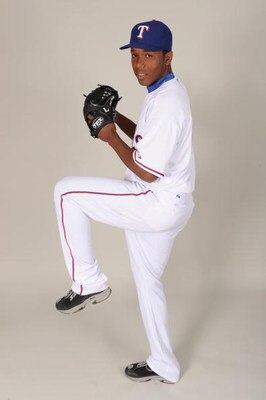 SURPRISE, ARIZONA - FEBRUARY 24:  Neftali Feliz #66 of the Texas Rangers during photo day at Surprise Stadium on February 24, 2009 in Surprise, Arizona. (Photo by: Harry How/Getty Images)