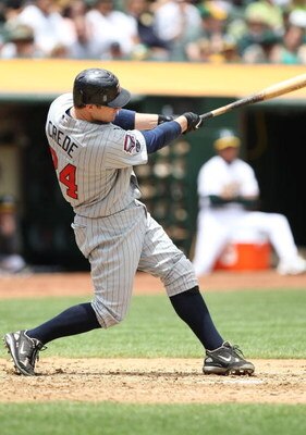 OAKLAND, CA - JUNE 11:  Joe Crede #24 of the Minnesota Twins bats against the Oakland Athletics during a Major League Baseball game on June 11, 2009 at the Oakland Coliseum in Oakland, California.  (Photo by Jed Jacobsohn/Getty Images)