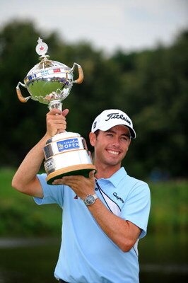 OAKVILLE, ON - JULY 27:  Chez Reavie lifts the winner's trophy after winning the RBC Canadian Open at the Glen Abbey Golf Club on July 27, 2008 in Oakville, Ontario, Canada.  (Photo by Robert Laberge/Getty Images)