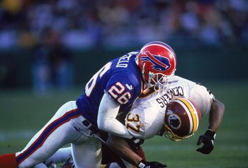 7 Nov 1999:  Antoine Winfield #26 of the Buffalo Bills tackles Larry Centers #37 of the Washington Redskins during the game at the Redskins Stadium in Landover, Maryland. The Bills defeated the Redskins 34-17. Mandatory Credit: Doug Pensinger  /Allsport