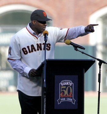SAN FRANCISCO - AUGUST 9: Barry Bonds points toward the Dodger dugout during a San Francisco Giants 50th Anniversary celebration before the game between the Los Angeles Dodgers and San Francisco Giants at AT&T Park on August 9, 2008 in San Francisco, Cali