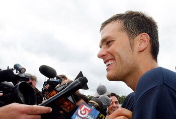 FOXBORO, MA - JULY 24:  Tom Brady #12 of the New England Patriots respond to questions during the first day of training camp at Gillette Stadium on July 24, 2008 in Foxboro, Massachusetts.  (Photo by Jim Rogash/Getty Images)
