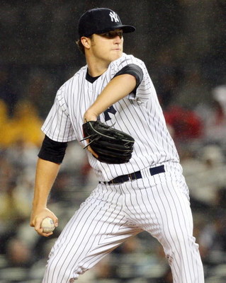 NEW YORK - MAY 04:  Phil Hughes #65 of the New York Yankees pitches against the Boston Red Sox on May 4, 2009 at Yankee Stadium in the Bronx borough of New York City. The Red Sox defeated the Yankees 6-4  (Photo by Jim McIsaac/Getty Images)