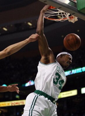 BOSTON - JANUARY 14:  Paul Pierce #34 of the Boston Celtics dunks the ball in the first half against the New Jersey Nets at TD Banknorth Garden January 14, 2009 in Boston, Massachusetts.  NOTE TO USER: User expressly acknowledges and agrees that, by downl