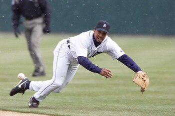 05 APRIL 2002:  Damion Easley #9, of the Detroit Tigers  tries to field a ground ball against the Cleveland Indians at the Tigers'' home opener at Comerica Park in Detroit,  MI. Cleveland won the game 10-1. DIGITAL IMAGE. Mandatory Credit: Tom Pidgeon/Get