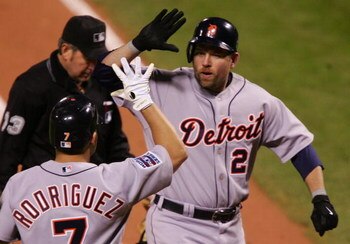 ST LOUIS - OCTOBER 26:  Sean Casey #21 of the Detroit Tigers celebrates with Ivan Rodriguez after Casey hit a solo home run in the top of the second inning against Jeff Suppan #37 of the St. Louis Cardinals during Game Four of the 2006 World Series on Oct