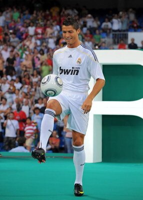 MADRID, SPAIN - JULY 06:  New Real Madrid player Cristiano Ronaldo is presented to a full house at the Santiago Bernabeu stadium on July 6, 2009 in Madrid, Spain.  (Photo by Denis Doyle/Getty Images)