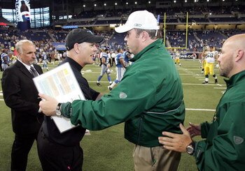DETROIT - SEPTEMBER 14:  Mike McCarthy, head coach of the Green Bay Packers, shakes hands at mid-field with head coach of the Detroit Lions, Rod Marinelli on September 14, 2008 at Ford Field in Detroit, Michigan.  (Photo by Domenic Centofanti/Getty Images