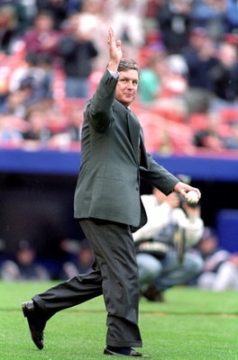3 Apr 2000:Tom Seaver waves to the crowd as he walks to the mound to throw the first pitchbefore a game against the New York Mets and the San Diego Padres at Shea Stadium in Flushing, New York. The Mets defeated the Padres 2-1. Mandatory Credit: Al Bello 
