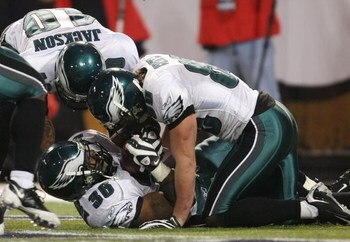MINNEAPOLIS - JANUARY 04:  Brian Westbrook #36  of the Philadelphia Eagles celebrates his touchdown with teammates DeSean Jackson #10 and Kevin Curtis #80 in the fourth quarter against the Minnesota Vikings during the NFC Wild Card playoff game on January