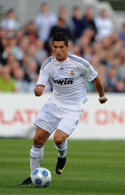 DUBLIN, IRELAND - JULY 20: Cristiano Ronaldo of Real Madrid in action during the Pre Season Friendly between Shamrock Rovers and Real Madrid at Tallaght Stadium on July 20, 2009 in Dublin, Ireland. (Photo by Laurence Griffiths/Getty Images)