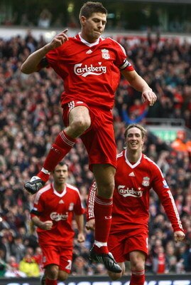 LIVERPOOL, UNITED KINGDOM - MARCH 22:  Steven Gerrard of Liverpool celebrates after scoring his team's third goal during the Barclays Premier League match between Liverpool and Aston Villa at Anfield on March 22, 2009 in Liverpool, England.  (Photo by Ale
