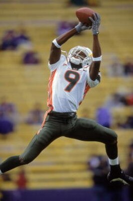 9 Sep 2000:  Kevin Beard #9 of the Miami Hurricanes catches the pass while jumping during the game against the Washington Huskies at the Husky Stadium in Seattle, Washington. The Huskies defeated the Hurricanes 34-29.Mandatory Credit: Otto Greule Jr.  /Al