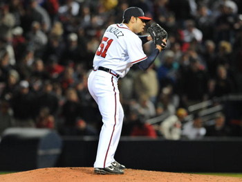 ATLANTA - APRIL 11: Pitcher Mike Gonzalez #51 of the Atlanta Braves throws in relief against the Washington Nationals on April 11, 2009 at Turner Field in Atlanta, Georgia. (Photo by Al Messerschmidt/Getty Images)