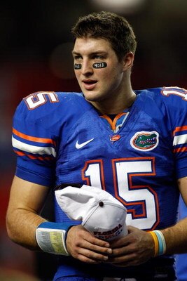 ATLANTA - DECEMBER 06:  Quarterback Tim Tebow #15 of the Florida Gators waits on stage after defeating the Alabama Crimson Tide during the SEC Championship on December 6, 2008 at the Georgia Dome in Atlanta, Georgia. The Gators defeated the Crimson Tide 3