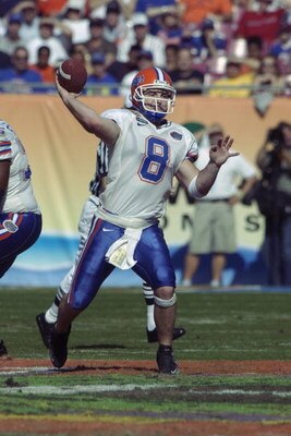 TAMPA, FL - JANUARY 1:  Quarterback Rex Grossman #8 of the Florida Gators throws a pass against the Michigan Wolverines during the Outback Bowl at Raymond James Stadium on January 1, 2003 in Tampa, Florida.  The Wolverines defeated the Gators 38-30.  (Pho