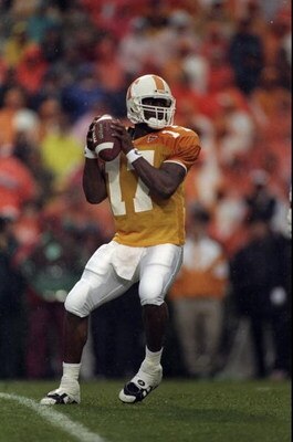 14 Nov 1998:  Quarterback Tee Martin #17 of the Tennessee Volunteers drops back to pass during a game against the Arkansas Razorbacks at the Neyland Stadium in Knoxville, Tennessee. The Volunteers defeated the Razorbacks 28-24. Mandatory Credit: Jonathan 