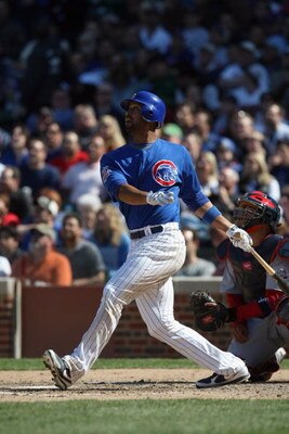 CHICAGO - APRIL 17:  Derrek Lee #25 of the Chicago Cubs bats against the St. Louis Cardinals on April 17, 2009 at Wrigley Field in Chicago, Illinois. (Photo by Jonathan Daniel/Getty Images) 