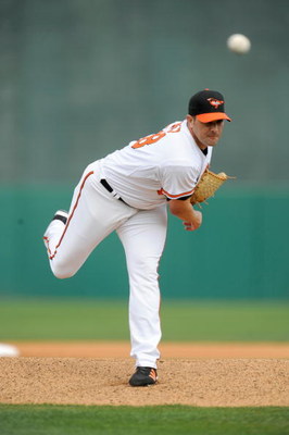 FORT LAUDERDALE, FL - FEBRUARY 26: Danys Baez #28 of the Baltimore Orioles pitches against the St Louis Cardinals during a spring training game at Fort Lauderdale Stadium on February 26, 2009 in Fort Lauderdale, Florida. (Photo by Rob Tringali/Getty Image