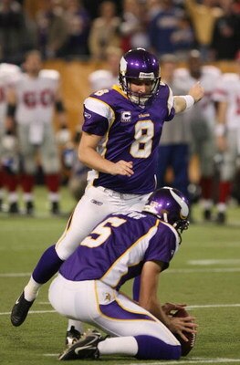 MINNEAPOLIS - DECEMBER 28:   Ryan Longwell #8 of the Minnesota Vikings kicks the game winning field goal as Chris Kluwe #5 holds in the final seconds of the game against the New York Giants on December 28,2008 at the Hubert H. Humphrey Metrodome in Minnea