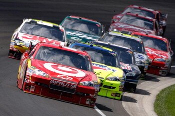 INDIANAPOLIS - JULY 26:  Juan Pablo Montoya, driver of the #42 Target Chevrolet, leads a pack of cars, during the NASCAR Sprint Cup Series Allstate 400 at the Brickyard at Indianapolis Motor Speedway on July 26, 2009 in Indianapolis, Indiana.  (Photo by J