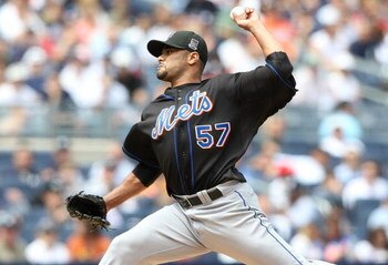 NEW YORK - JUNE 14:  Johan Santana #57 of the New York Mets pitches against the New York Yankees on June 14, 2009 at Yankee Stadium in the Bronx borough of New York City.  (Photo by Nick Laham/Getty Images)