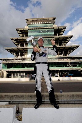 INDIANAPOLIS - JULY 26:  Jimmie Johnson, driver of the #48 Lowe's/KOBALT Tools Chevrolet, celebrates after winning the NASCAR Sprint Cup Series Allstate 400 at the Brickyard at Indianapolis Motor Speedway on July 26, 2009 in Indianapolis, Indiana.  (Photo