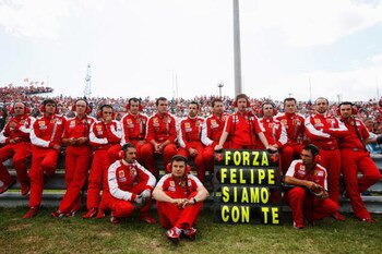 BUDAPEST, HUNGARY - JULY 26:  Ferrari team send their support to their injured driver Felipe Massa of Brazil before the Hungarian Formula One Grand Prix at the Hungaroring on July 26, 2009 in Budapest, Hungary.  (Photo by Mark Thompson/Getty Images)