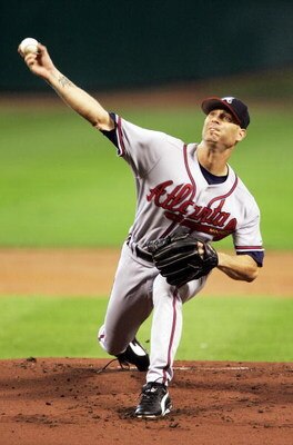 HOUSTON - OCTOBER 9:  Starting pitcher Tim Hudson #15 of the Atlanta Braves pitches in the first inning against the Houston Astros in Game Four of the 2005 National League Division Series on October 9, 2005 at Minute Maid Park in Houston, Texas.  (Photo b