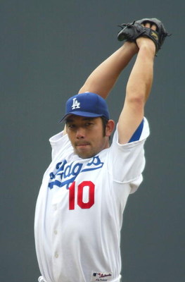 LOS ANGELES - JUNE 19:  Starting pitcher Hideo Nomo #10 of the Los Angeles Dodgers pitches against the New York Yankees during the second inning on June 19, 2004 at Dodger Stadium in Los Angeles, California. The Yankees beat the Dodgers 6-2.  (Photo by Li