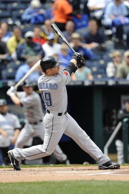 KANSAS CITY, MO - APRIL 30:  Marco Scutaro #19 of the Toronto Blue Jays connects for a first-inning home run off Kyle Davies of the Kansas City Royals on April 30, 2009 at Kauffman Stadium in Kansas City, Missouri. (Photo by G. Newman Lowrance/Getty Image